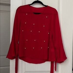 Red Blouse with Pearl Accents